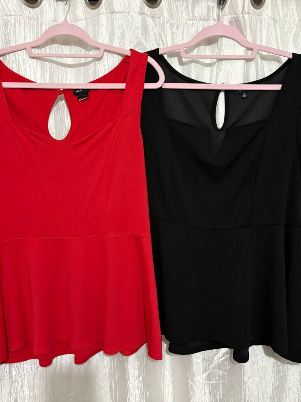 Set of two Torrid Peplum tops. One Red; One Black. Both Size 1 (14-16)